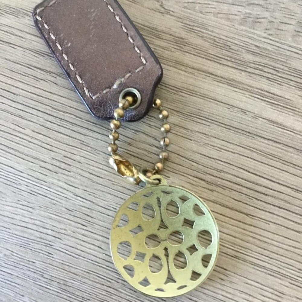 Coach Ergo Charm with Signature C Logo Cutout Pattern and Bronze Mini Tag - Picture 3 of 3